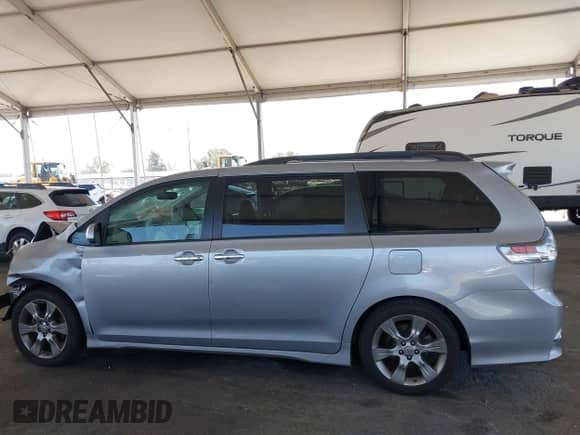 2014 Toyota Sienna SE with VIN 5TDXK3DC8ES485443, listed as a IAAI auction lot 42685176 with 91,853 mi miles and . Bid and sale history available at DreamBid. Image 15.