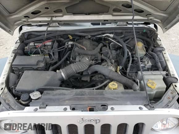 2008 Jeep Wrangler Unlimited X с VIN 1J4GB39128L634596, выставлен на аукционе Copart как лот 62750035 с пробегом 273 564 миль миль и Списание • Salvage title. История ставок и продаж доступна на DreamBid. Изображение 11.