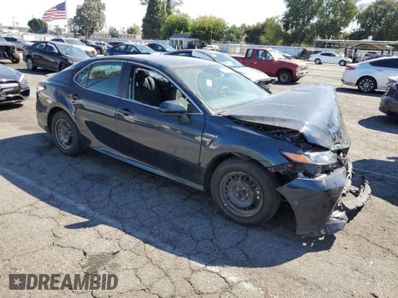 2019 Toyota Camry Hybrid LE с VIN 4T1B31HK2KU517027, выставлен на аукционе Copart как лот 85885055 с пробегом 84 432 миль миль и Списание • Salvage title. История ставок и продаж доступна на DreamBid. Изображение 4.