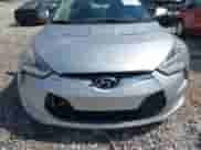 2012 Hyundai Veloster w/Red Int z VIN KMHTC6AD2CU061478, wystawiony jako IAAI lot #43104434 z przebiegiem 216 113 mil mil oraz . Historia ofert i sprzedaży dostępna na DreamBid. Obrazek 6.