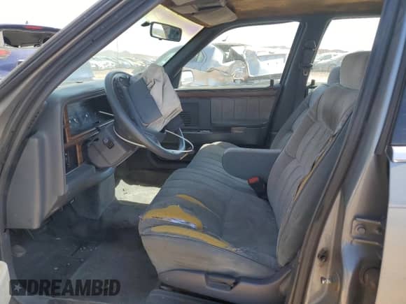 1991 Dodge Dynasty LE with VIN 1B3XC56R9MD115785, listed as a Copart auction lot 48073715 with 64,483 mi miles and Salvage title. Bid and sale history available at DreamBid. Image 7.