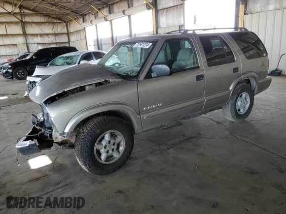 2004 Chevrolet Blazer LS z VIN 1GNDT13X84K120850, wystawiony jako Copart lot #72561234 z przebiegiem 188 094 mil mil oraz Szkoda całkowita • Salvage title. Historia ofert i sprzedaży dostępna na DreamBid. Obrazek 1.