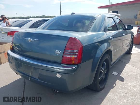 2005 Chrysler 300 C with VIN 2C3AA63H55H658765, listed as a IAAI auction lot 43453775 with 176,285 mi miles and . Bid and sale history available at DreamBid. Image 4.