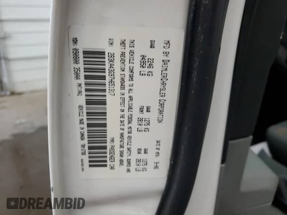 2007 Dodge Charger z VIN 2B3KA43G97H651317, wystawiony jako Copart lot #70777574 z przebiegiem 152 071 mil mil oraz Szkoda całkowita • Salvage title. Historia ofert i sprzedaży dostępna na DreamBid. Obrazek 13.