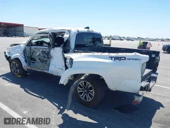 2020 Toyota Tacoma SR5 with VIN 5TFAZ5CN3LX093798, listed as a IAAI auction lot 42212050 with 85,632 mi miles and . Bid and sale history available at DreamBid. Image 3.