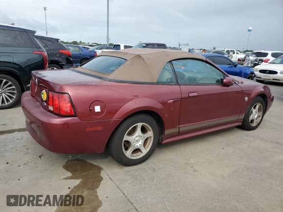 2004 Ford Mustang Deluxe z VIN 1FAFP44484F115156, wystawiony jako Copart lot #75246024 z przebiegiem Nie podano mil oraz Nie do naprawy • Non repairable. Historia ofert i sprzedaży dostępna na DreamBid. Obrazek 3.