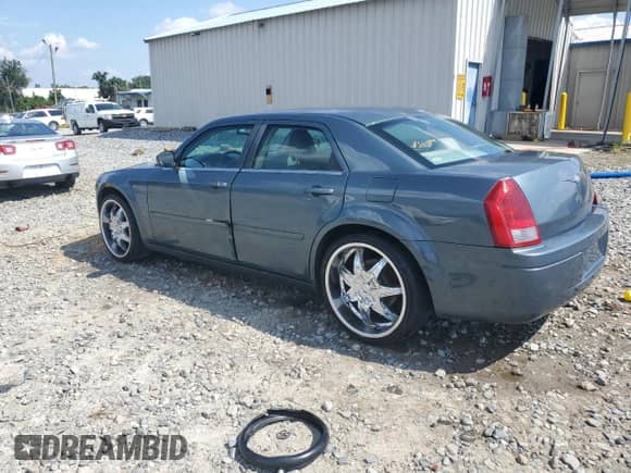 2006 Chrysler 300 with VIN 2C3KA43R06H365956, listed as a Copart auction lot 69290075 with 167,463 mi miles and Salvage title. Bid and sale history available at DreamBid. Image 2.