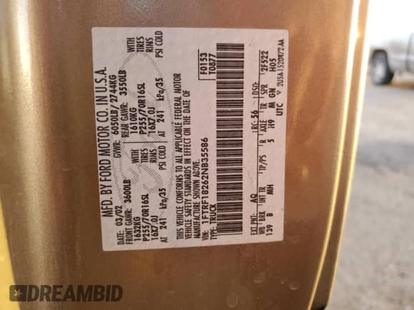 2002 Ford F-150 XL z VIN 1FTRF18262NB35586, wystawiony jako Copart lot #77114114 z przebiegiem 166 942 mil mil oraz Szkoda całkowita • Salvage title. Historia ofert i sprzedaży dostępna na DreamBid. Obrazek 12.