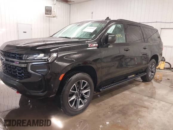2021 Chevrolet Suburban Z71 z VIN 1GNSKDKD7MR355119, wystawiony jako IAAI lot #41310941 z przebiegiem 146 399 mil mil oraz . Historia ofert i sprzedaży dostępna na DreamBid. Obrazek 2.