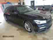 2019 BMW 7 Series 750i xDrive z VIN WBA7F2C51KB239044, wystawiony jako IAAI lot #42756026 z przebiegiem 65 028 mil mil oraz . Historia ofert i sprzedaży dostępna na DreamBid. Obrazek 1.