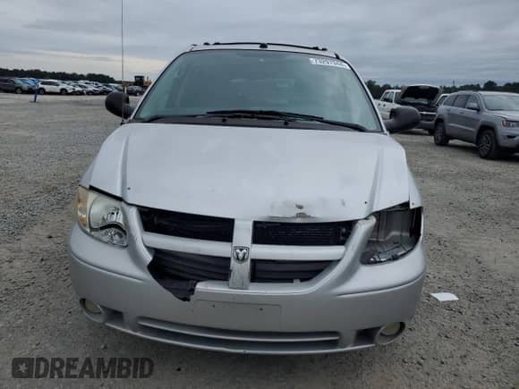 2005 Dodge Caravan SXT с VIN 2D4GP44L65R525599, выставлен на аукционе Copart как лот 73297944 с пробегом 230 808 миль миль и Списание • Salvage title. История ставок и продаж доступна на DreamBid. Изображение 5.
