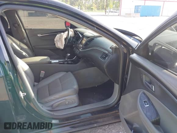 2014 Chevrolet Impala LT z VIN 2G1115SL0E9266677, wystawiony jako IAAI lot #42460862 z przebiegiem 192 674 mil mil oraz . Historia ofert i sprzedaży dostępna na DreamBid. Obrazek 5.