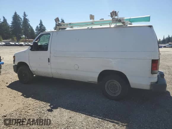 2012 Ford Econoline Cargo Commercial with VIN 1FTNE1EW2CDB34452, listed as a Copart auction lot 66587925 with 212,296 mi miles and Clean title. Bid and sale history available at DreamBid. Image 2.