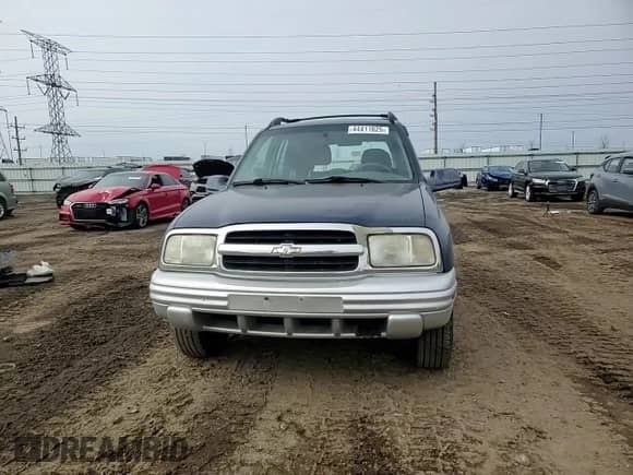 2001 Chevrolet Tracker LT with VIN 2CNBJ634716943286, listed as a Copart auction lot 44411025 with 161,513 mi miles and Salvage title. Bid and sale history available at DreamBid. Image 10.