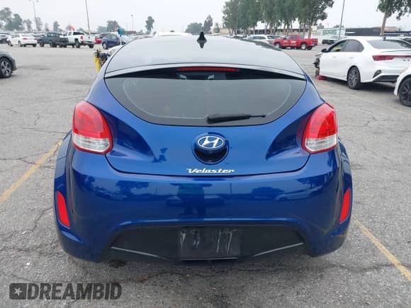 2015 Hyundai Veloster z VIN KMHTC6AD0FU243328, wystawiony jako IAAI lot #42439313 z przebiegiem 96 997 mil mil oraz . Historia ofert i sprzedaży dostępna na DreamBid. Obrazek 16.