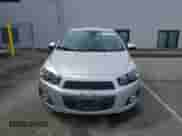 2014 Chevrolet Sonic LTZ с VIN 1G1JE6SB5E4131294, выставлен на аукционе Copart как лот 80164615 с пробегом 69 644 миль миль и Списание • Salvage title. История ставок и продаж доступна на DreamBid. Изображение 5.