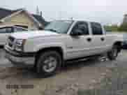 2004 Chevrolet Silverado 2500 LT with VIN 1GCGC23U14F129092, listed as a Copart auction lot 57763385 with 142,896 mi miles and Salvage title. Bid and sale history available at DreamBid. Image 1.