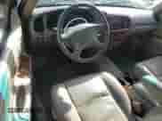 2002 Toyota Tundra Limited z VIN 5TBBT48152S291074, wystawiony jako Copart lot #81852585 z przebiegiem 269 192 mil mil oraz Szkoda całkowita • Salvage title. Historia ofert i sprzedaży dostępna na DreamBid. Obrazek 8.