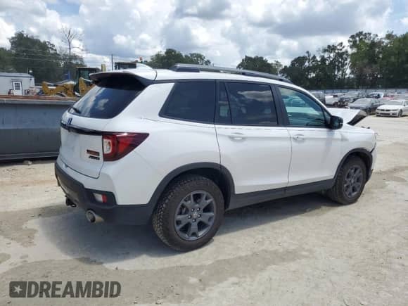 2025 Honda Passport TrailSport with VIN 5FNYF8H69SB009955, listed as a Copart auction lot 67210885 with 13,002 mi miles and Salvage title. Bid and sale history available at DreamBid. Image 3.