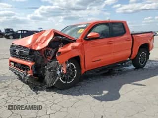 2024 Toyota Tacoma SR5 with VIN 3TYKB5FN3RT008594, listed as a Copart auction lot 71997305 with 27,740 mi miles and Salvage title. Bid and sale history available at DreamBid. Image 1.