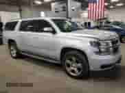 2015 Chevrolet Suburban LT с VIN 1GNSKJKCXFR300348, выставлен на аукционе Copart как лот 82416055 с пробегом 140 250 миль миль и Списание • Salvage title. История ставок и продаж доступна на DreamBid. Изображение 4.