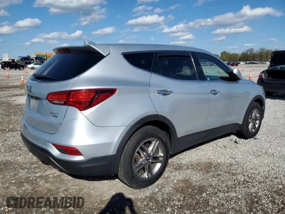 2017 Hyundai Santa Fe 2.4L with VIN 5XYZTDLB5HG440157, listed as a Copart auction lot 82679375 with 78,557 mi miles and Salvage title. Bid and sale history available at DreamBid. Image 3.