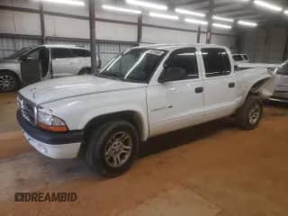 2004 Dodge Dakota Sport z VIN 1D7HL38NX4S579316, wystawiony jako Copart lot #68731865 z przebiegiem 183 085 mil mil oraz Szkoda całkowita • Salvage title. Historia ofert i sprzedaży dostępna na DreamBid. Obrazek 1.