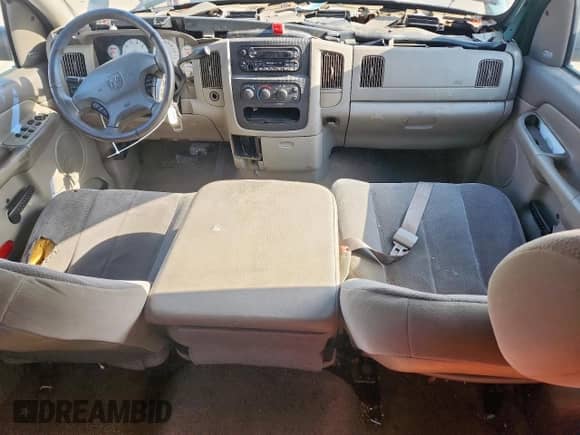 2002 Dodge 1500 with VIN 3B7HA18Z12G106142, listed as a Copart auction lot 61826335 with 221,059 mi miles and Salvage title. Bid and sale history available at DreamBid. Image 8.