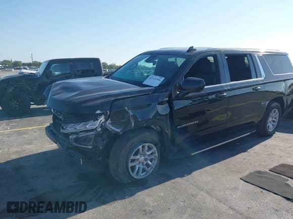 2023 Chevrolet Suburban LT with VIN 1GNSKCKD3PR203675, listed as a IAAI auction lot 42313306 with 62,572 mi miles and . Bid and sale history available at DreamBid. Image 2.