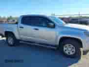 2020 Chevrolet Colorado 4WD Work Truck z VIN 1GCGTBENXL1205894, wystawiony jako IAAI lot #41058177 z przebiegiem 61 374 mil mil oraz . Historia ofert i sprzedaży dostępna na DreamBid. Obrazek 13.