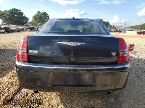 2007 Chrysler 300 C with VIN 2C3LA63H57H765570, listed as a Copart auction lot 65699425 with 180,116 mi miles and Salvage title. Bid and sale history available at DreamBid. Image 6.