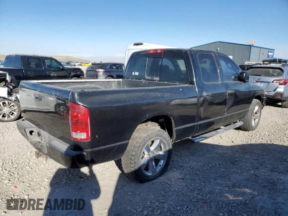 2002 Dodge RAM z VIN 1B7HA18N72J118436, wystawiony jako Copart lot #53749585 z przebiegiem 254 723 mil mil oraz Szkoda całkowita • Salvage title. Historia ofert i sprzedaży dostępna na DreamBid. Obrazek 3.