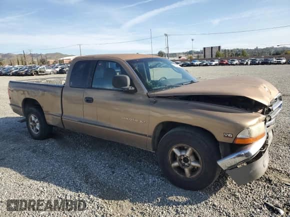 2000 Dodge Dakota с VIN 1B7GL22X2YS614382, выставлен на аукционе Copart как лот 48252635 с пробегом 273 680 миль миль и Списание • Salvage title. История ставок и продаж доступна на DreamBid. Изображение 4.