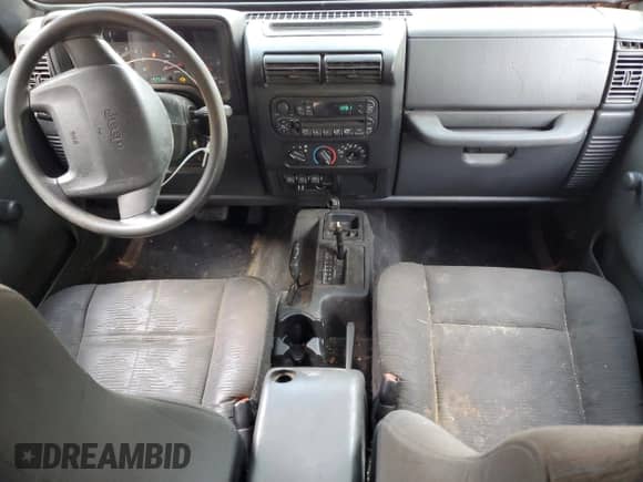 2004 Jeep Wrangler Sport z VIN 1J4FA49S94P714137, wystawiony jako Copart lot #80966325 z przebiegiem 142 534 mil mil oraz Czysty tytuł • Clean title. Historia ofert i sprzedaży dostępna na DreamBid. Obrazek 8.