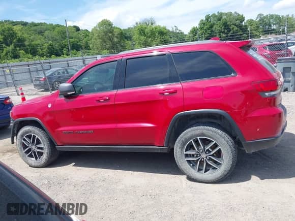 2017 Jeep Grand Cherokee Trailhawk z VIN 1C4RJFLT8HC693715, wystawiony jako IAAI lot #42531133 z przebiegiem 128 250 mil mil oraz . Historia ofert i sprzedaży dostępna na DreamBid. Obrazek 14.