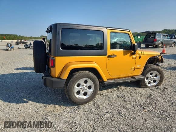 2014 Jeep Wrangler Sahara с VIN 1C4AJWBG1EL266289, выставлен на аукционе Copart как лот 81712295 с пробегом 128 403 миль миль и Списание • Salvage title. История ставок и продаж доступна на DreamBid. Изображение 3.