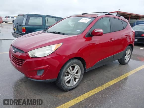2012 Hyundai Tucson GLS with VIN KM8JU3AC1CU512149, listed as a IAAI auction lot 43270418 with 167,009 mi miles and . Bid and sale history available at DreamBid. Image 2.