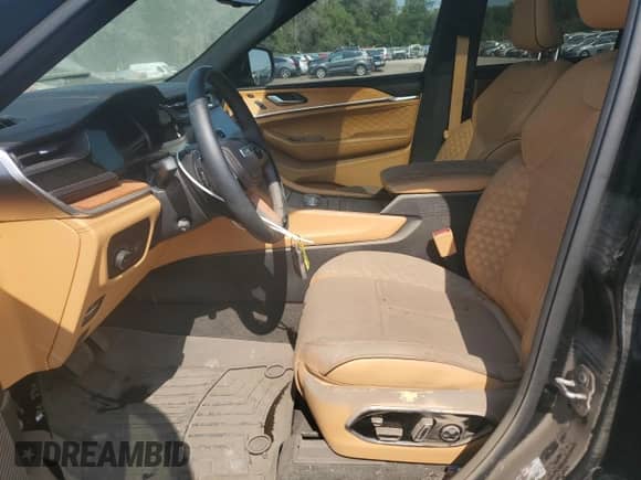 2022 Jeep Grand Cherokee Summit Reserve z VIN 1C4RJHEG4N8614387, wystawiony jako Copart lot #70836634 z przebiegiem Nie podano mil oraz Szkoda całkowita • Salvage title. Historia ofert i sprzedaży dostępna na DreamBid. Obrazek 7.