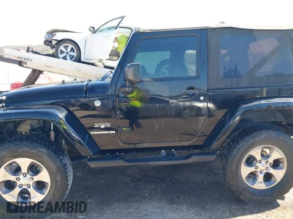2016 Jeep Wrangler Sahara with VIN 1C4AJWBG0GL174481, listed as a IAAI auction lot 41868149 with 59,300 mi miles and . Bid and sale history available at DreamBid. Image 14.