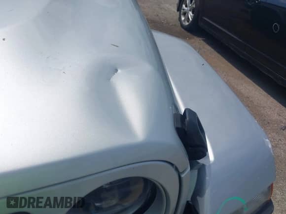 2023 Jeep Wrangler Sahara with VIN 1C4JJXP69PW695915, listed as a IAAI auction lot 42662028 with 36,957 mi miles and . Bid and sale history available at DreamBid. Image 17.