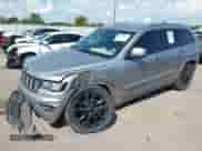 2018 Jeep Grand Cherokee Altitude with VIN 1C4RJEAG7JC181921, listed as a IAAI auction lot 43208554 with 157,255 mi miles and . Bid and sale history available at DreamBid. Image 2.