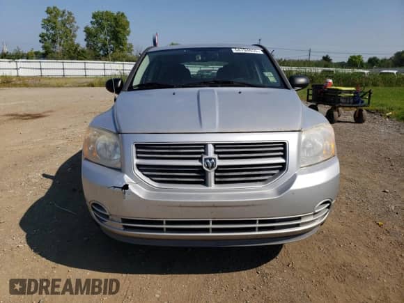 2011 Dodge Caliber z VIN 1B3CB1HA3BD296851, wystawiony jako Copart lot #68704655 z przebiegiem 113 601 mil mil oraz Czysty tytuł • Clean title. Historia ofert i sprzedaży dostępna na DreamBid. Obrazek 5.