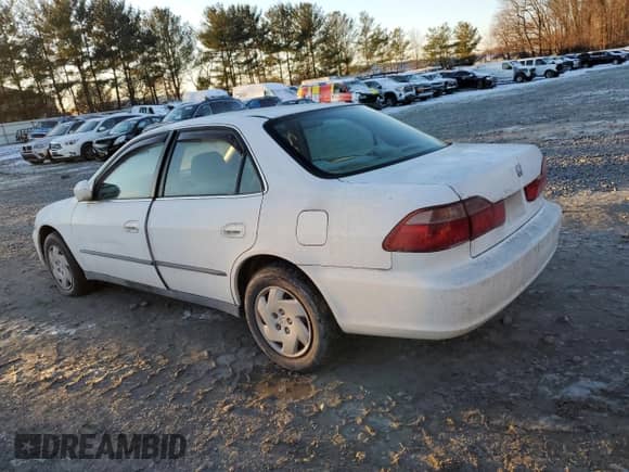 1999 Honda Accord LX with VIN 1HGCG1644XA068753, listed as a Copart auction lot 87135784 with 74,386 mi miles and Clean title. Bid and sale history available at DreamBid. Image 2.