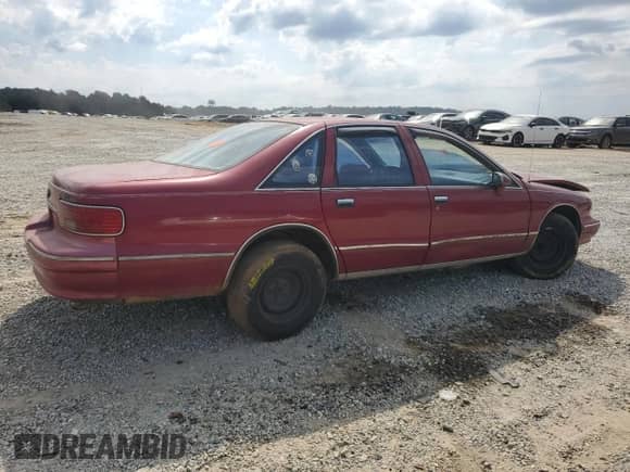 1994 Chevrolet Caprice с VIN 1G1BL52W1RR165488, выставлен на аукционе Copart как лот 71604985 с пробегом Не указан миль и Списание • Salvage title. История ставок и продаж доступна на DreamBid. Изображение 3.
