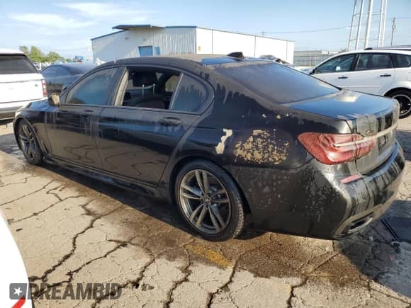 2019 BMW 7 Series 750i xDrive with VIN WBA7F2C53KB240017, listed as a Copart auction lot 65009774 with 11,175 mi miles and Salvage title. Bid and sale history available at DreamBid. Image 2.