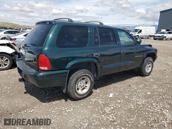 1999 Dodge Durango with VIN 1B4HS28Y4XF602018, listed as a Copart auction lot 55692175 with 135,058 mi miles and Salvage title. Bid and sale history available at DreamBid. Image 3.