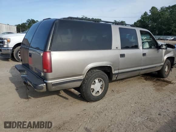 1999 Chevrolet Suburban с VIN 3GNEC16R3XG229911, выставлен на аукционе Copart как лот 55305415 с пробегом 315 759 миль миль и Списание • Salvage title. История ставок и продаж доступна на DreamBid. Изображение 3.