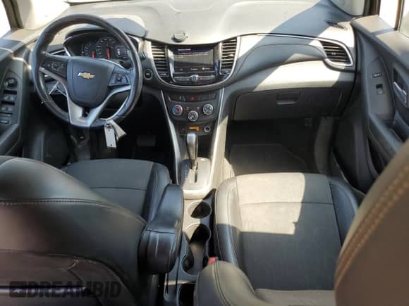 2021 Chevrolet Trax LT с VIN KL7CJLSM3MB369857, выставлен на аукционе Copart как лот 81872185 с пробегом 76 181 миль миль и Списание • Salvage title. История ставок и продаж доступна на DreamBid. Изображение 8.