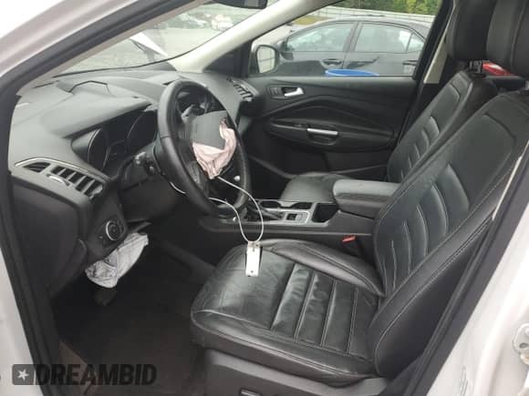 2017 Ford Escape Titanium with VIN 1FMCU9J94HUA99621, listed as a Copart auction lot 67202945 with 179,759 mi miles and Salvage title. Bid and sale history available at DreamBid. Image 7.