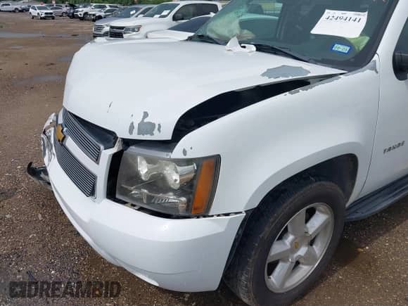 2007 Chevrolet Tahoe LTZ z VIN 1GNFC13J37J122309, wystawiony jako IAAI lot #42494141 z przebiegiem 81 634 mil mil oraz . Historia ofert i sprzedaży dostępna na DreamBid. Obrazek 6.